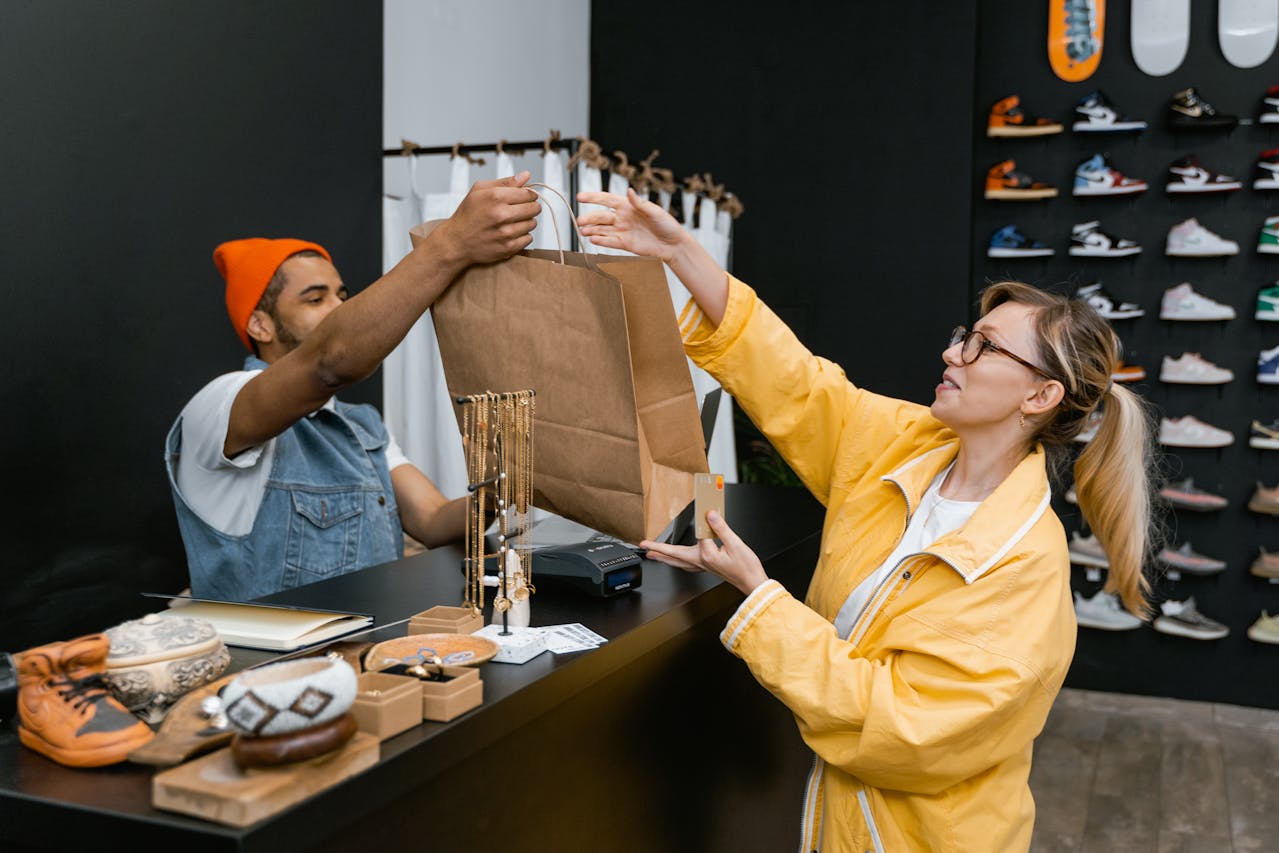 Customer buying sneakers at an independent store